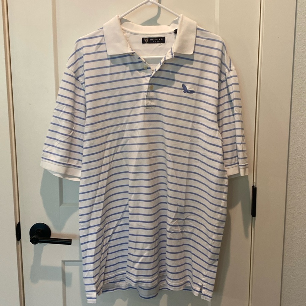 Oxford Golf amen’s Short Sleeve Polo. White w/Light Blue Stripe. Large.